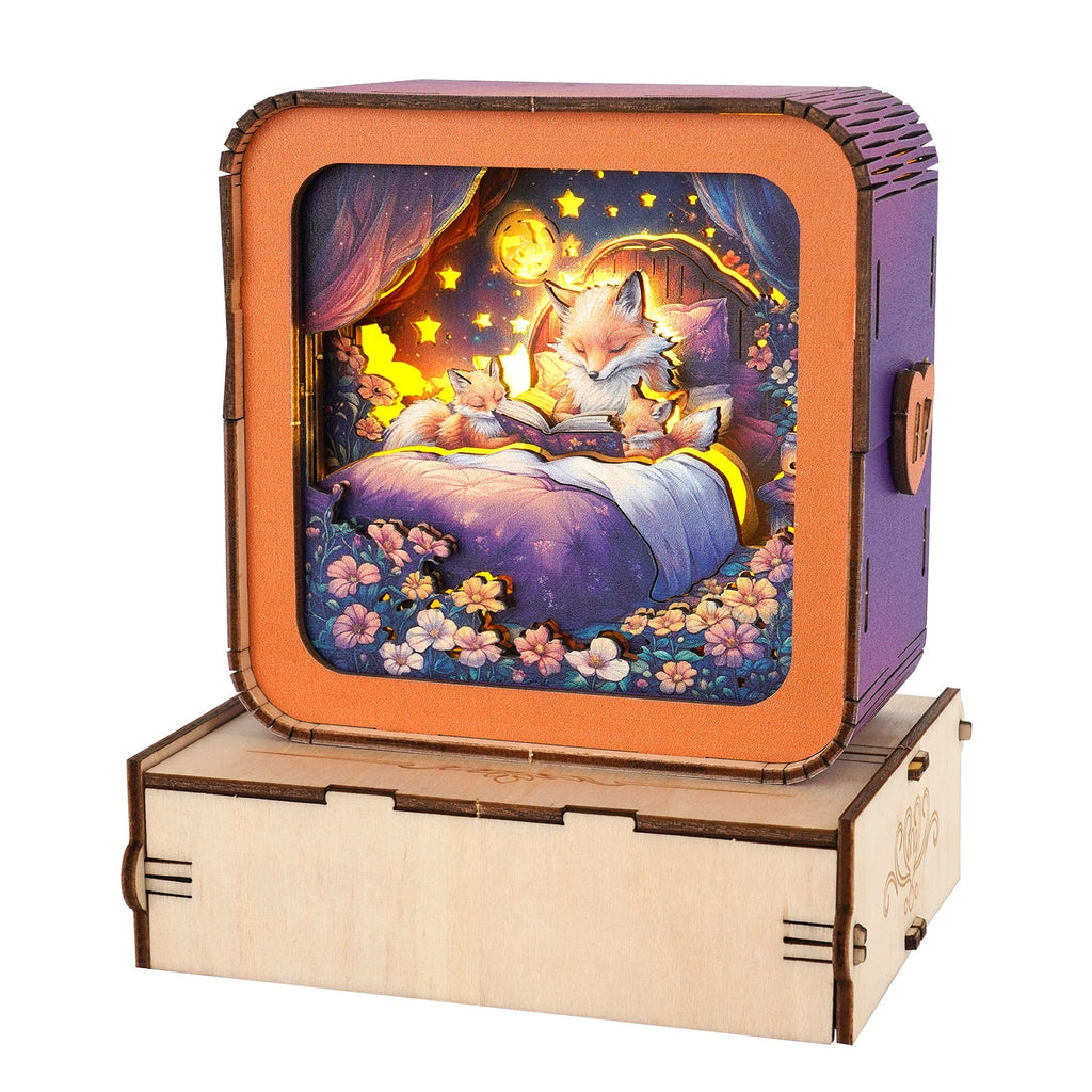 3D wooden puzzle night light featuring a cozy scene of foxes reading bedtime stories.