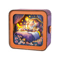 3D wooden puzzle night light featuring foxes reading in bed, colorful and cozy home decor.