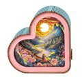 Heart-shaped 3D wooden puzzle night light featuring a romantic sunset scene with roses and lovers by a river.