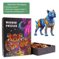Pitbull-2 wooden jigsaw puzzle in ornate packaging revealing colorful puzzle pieces and a vibrant dog figure.