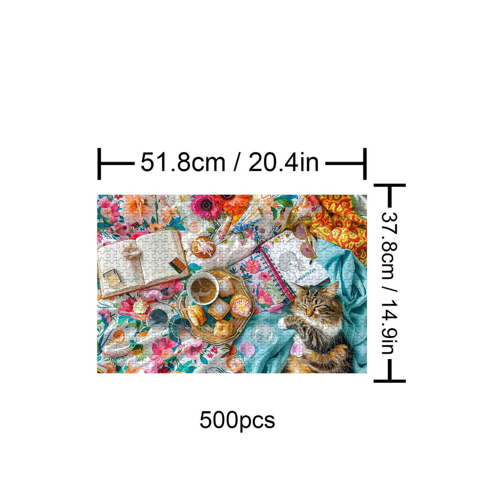 Leisure Time 500 Piece Puzzle featuring a cat, floral blanket, snacks, and a notebook for a cozy puzzle experience.