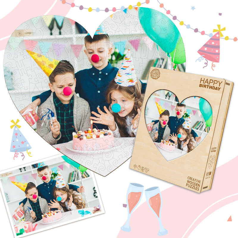 Personalized wooden photo puzzle shaped like a heart, featuring kids celebrating a birthday with cake and party hats.